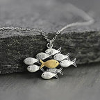 Dashingsoul School Of Fish With One Golden Enameled Fish Swimming Upstream Necklace